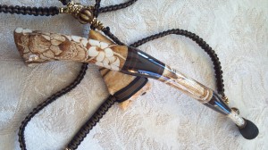 The lanyard for this call has a 400 year old stone spear head found in a creek bed in Pike County, Missouri braided into it.